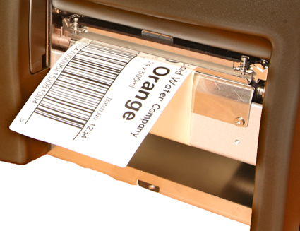 Label dispenser - to dispense labels as you print