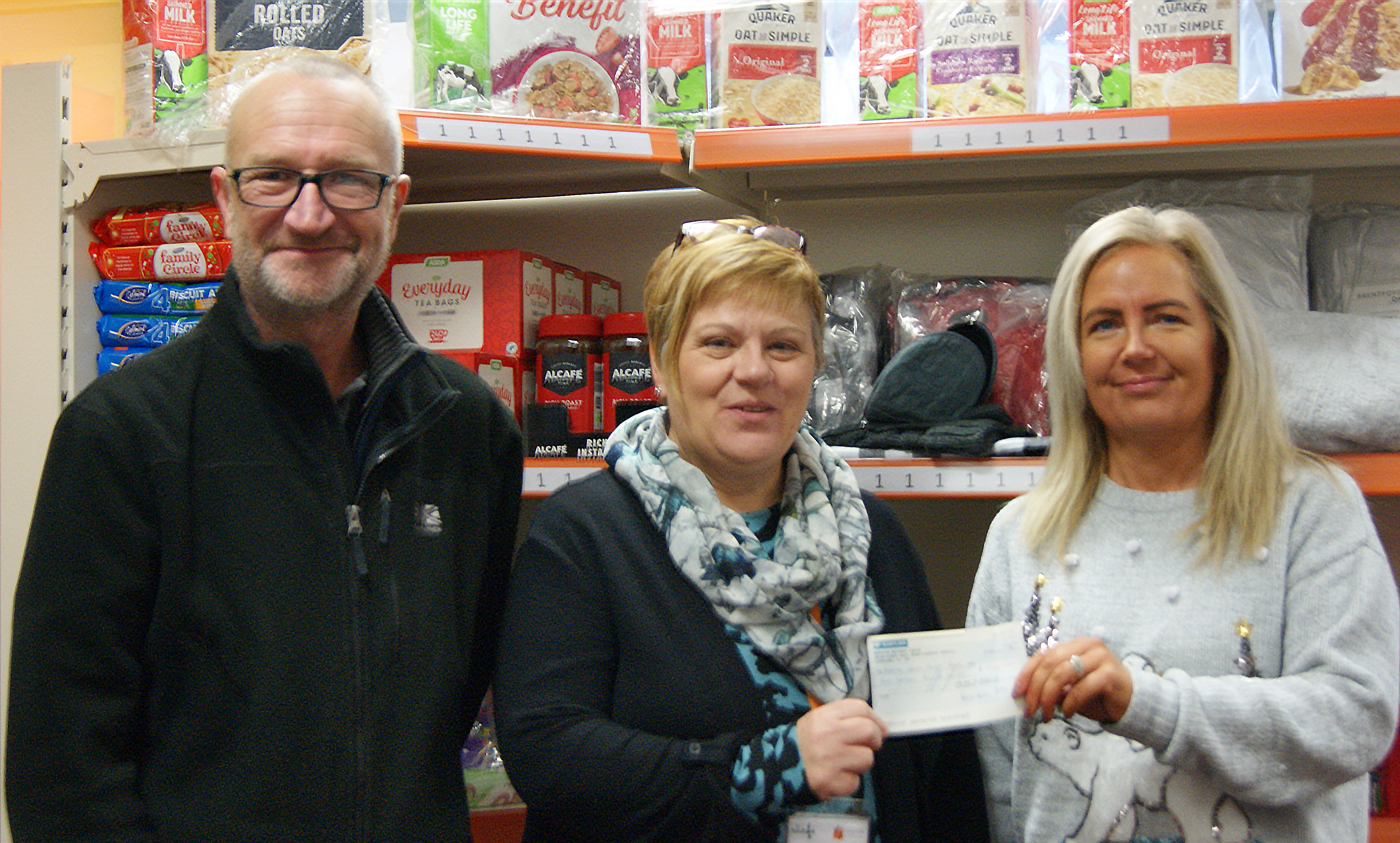 CTG Ltd Employee Ownership Directors hand over cheque to Redcar food bank